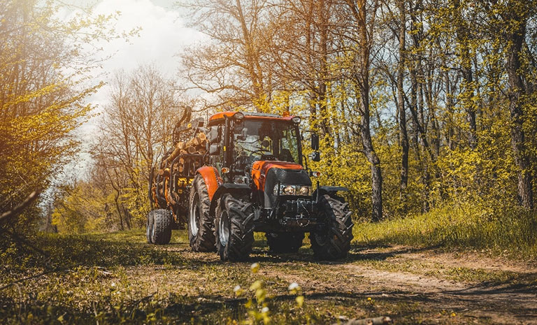 Tractor on forest path